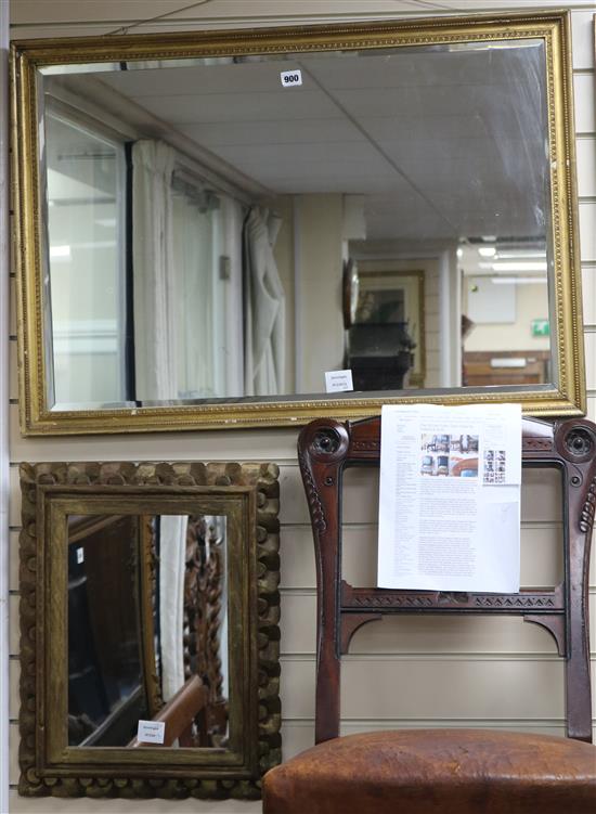 A carved giltwood picture framed wall mirror and a rectangular beaded gilt framed wall mirror W.88 and 40cm